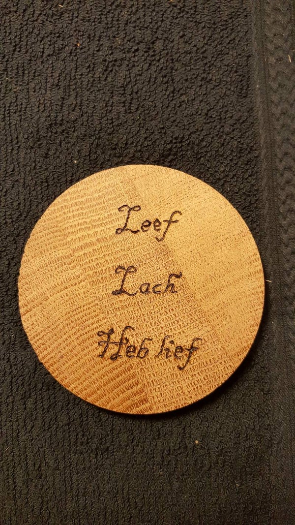 Houten onderzetter met Tekst