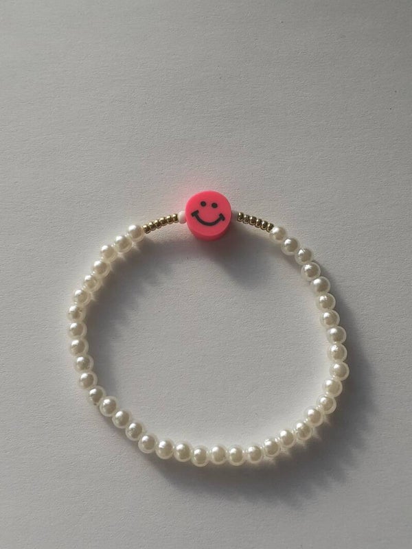 Pink smiley pearl