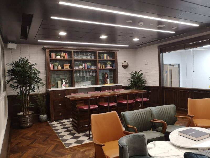 East Grinstead commercial fit-out with timber bar and fitted shelving