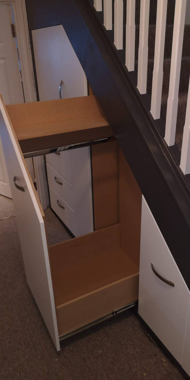 Pull-out understairs storage drawer made by an East Grinstead carpenter