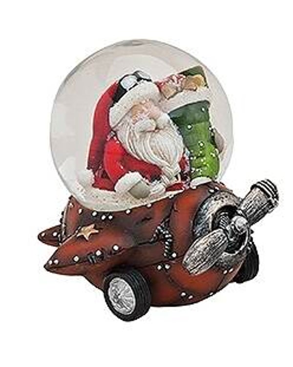 Sneeuwbol Kerstman met grote zak cadeaus in vliegtuig