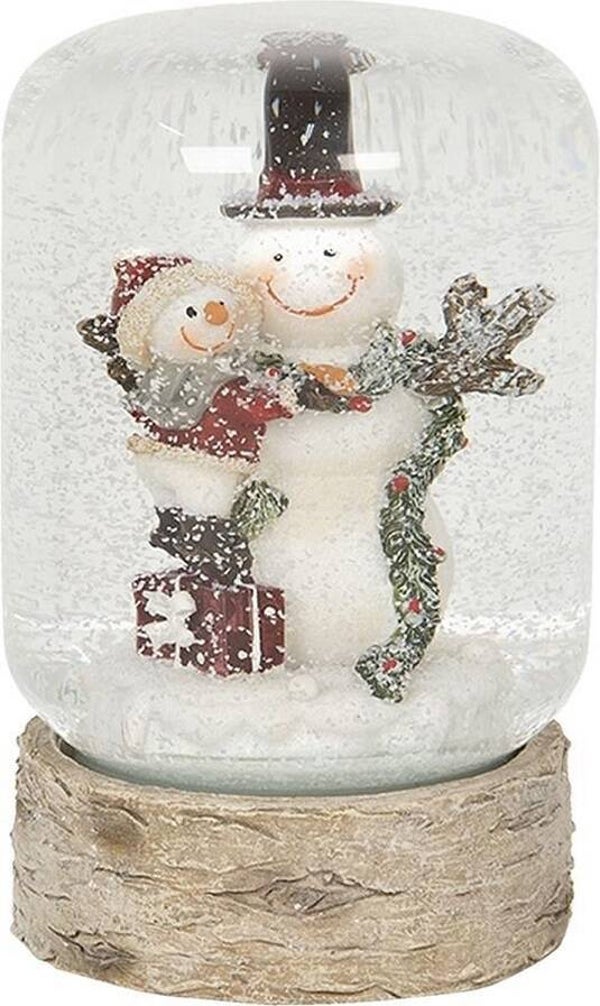 Sneeuwbol Sneeuwpop met kind in kerstsfeer