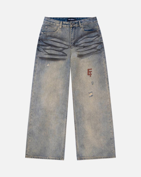 Woman dirty washed brown jeans