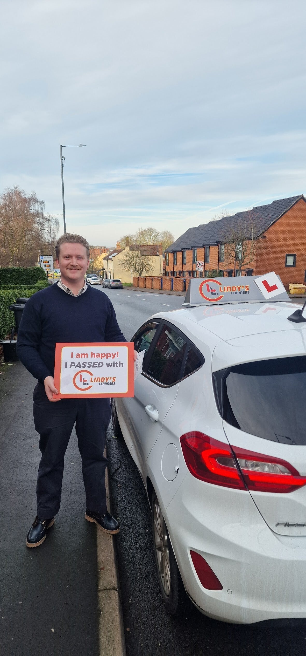 Photo of a happy student with a Driving Certificate from an easy passed exam day - Student No.14