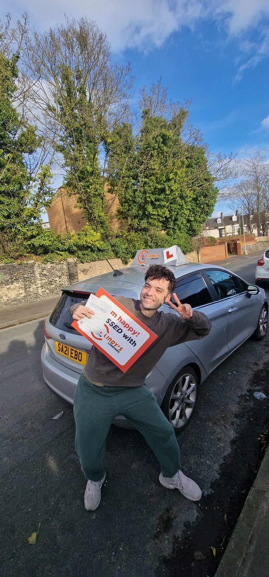 Photo of a happy student with a Driving Certificate from an easy passed exam day - Student No.16