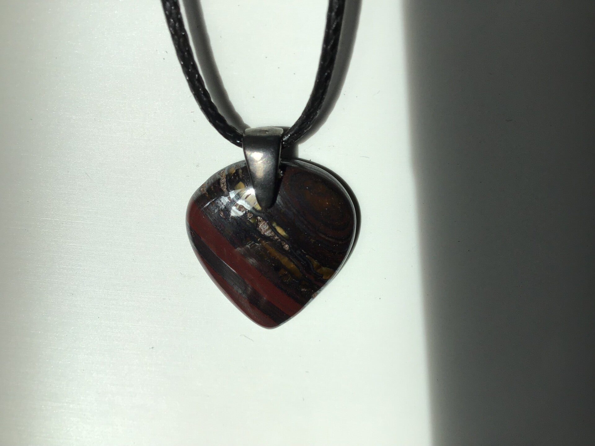 Pendentif oeil de fer coeur