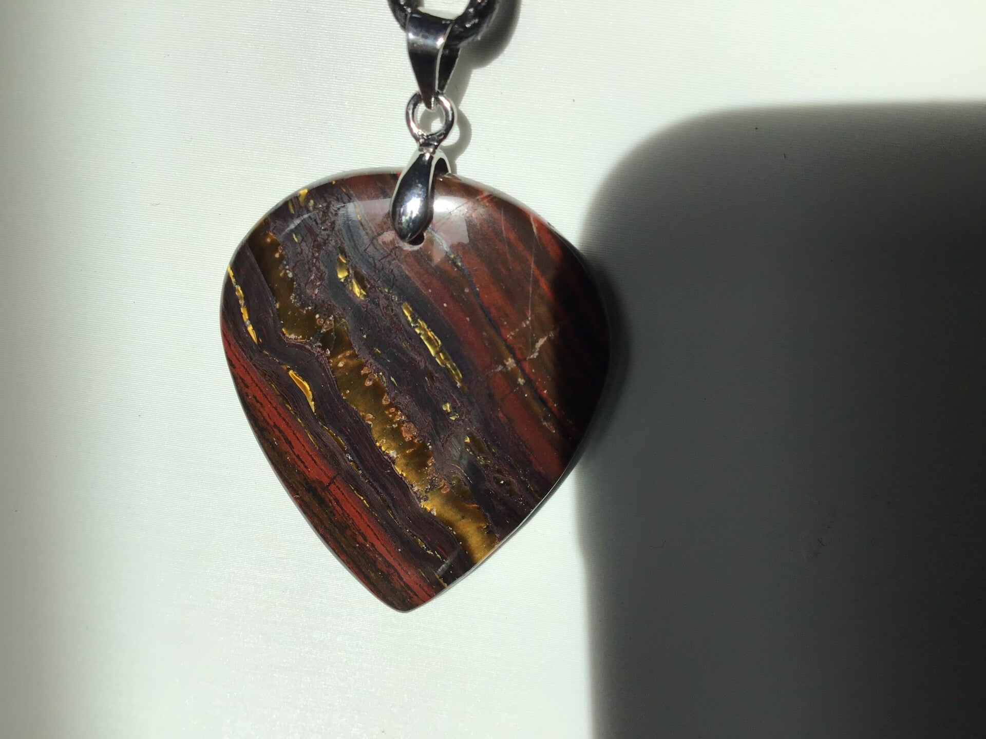 Pendentif oeil de fer grand coeur