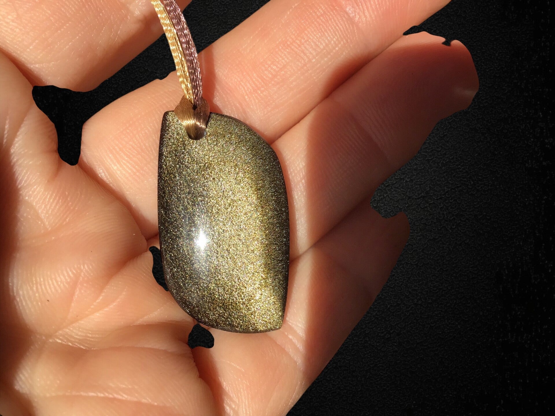 Pendentif obsidienne dorée sur cordon bicolore