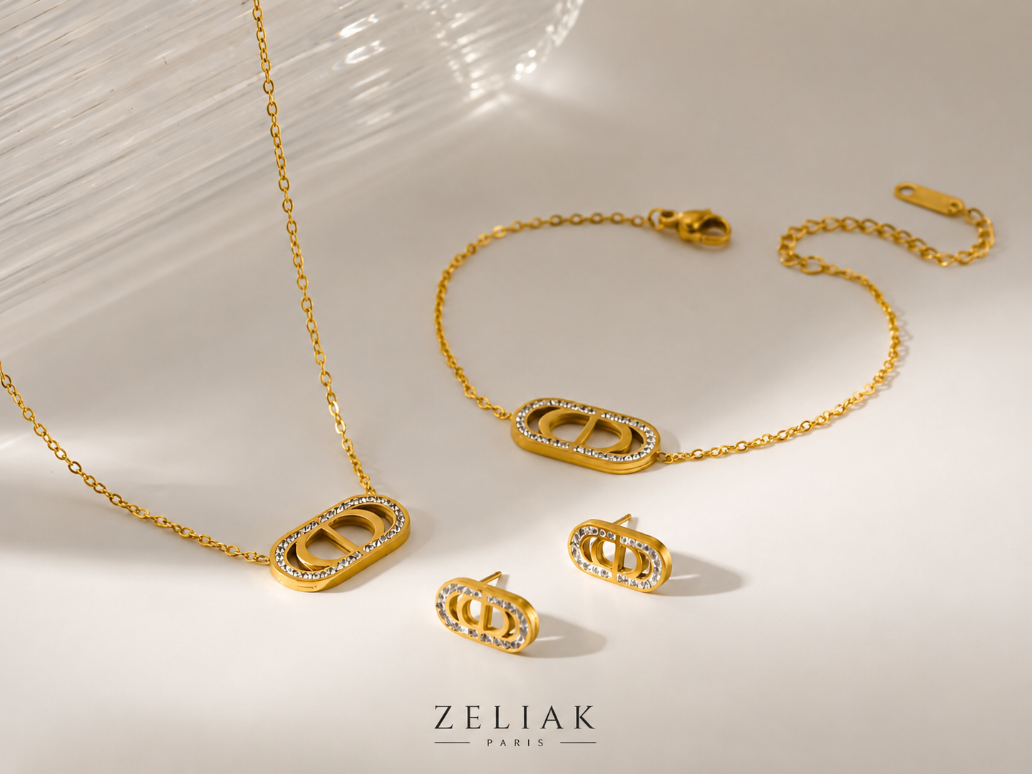 Parure dorée Éclat – Collier, bracelet & boucles d’oreilles