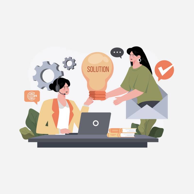 Two people talking through a solution