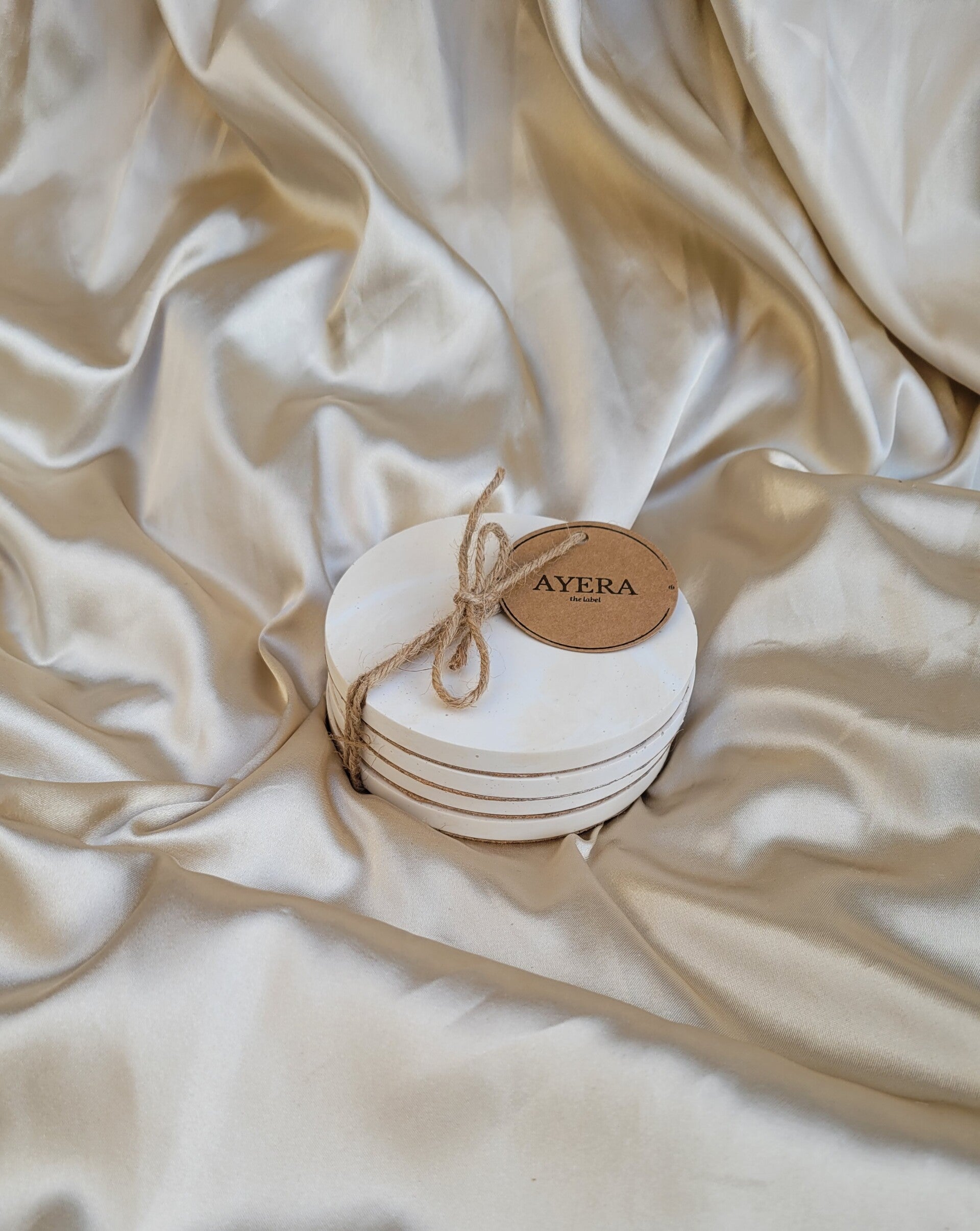 Onderzetters vorm Mila marmer beige/wit