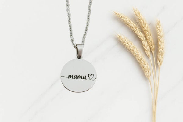 A simple and meaningful necklace for everyday wear. This engraved “mama ♥” pendant is crafted in high-quality stainless steel, waterproof and tarnish-free — a piece she’ll treasure forever.