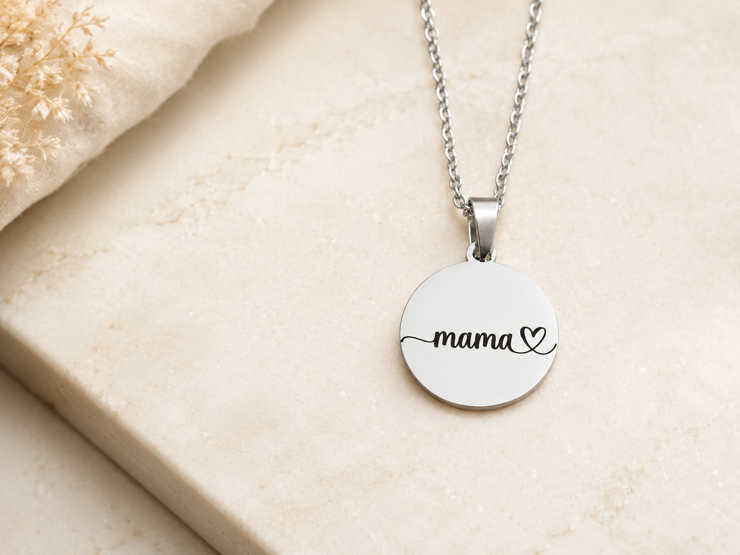 A simple and meaningful necklace for everyday wear. This engraved “mama ♥” pendant is crafted in high-quality stainless steel, waterproof and tarnish-free — a piece she’ll treasure forever.