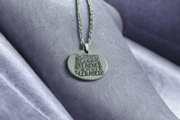 Thoughtful Teacher Appreciation Necklace in stainless steel. Engraved “Teacher” definition. A perfect thank-you gift for end of school year, Christmas, or graduation. Waterproof and gift-ready.