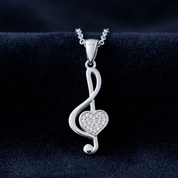 "Clave de sol corazón" en plata 925