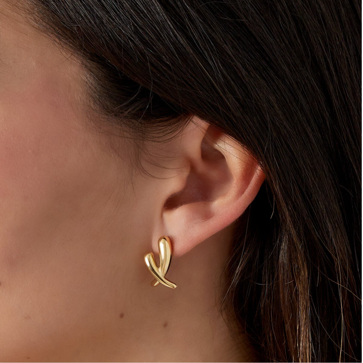 Gekruisde oorbellen goud