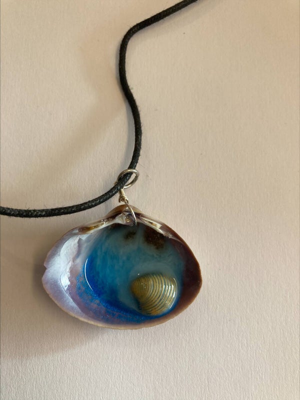 Schelphanger met schelp