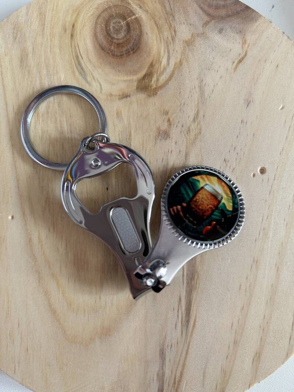 Porte-clé coupe ongle + décapsuleur
