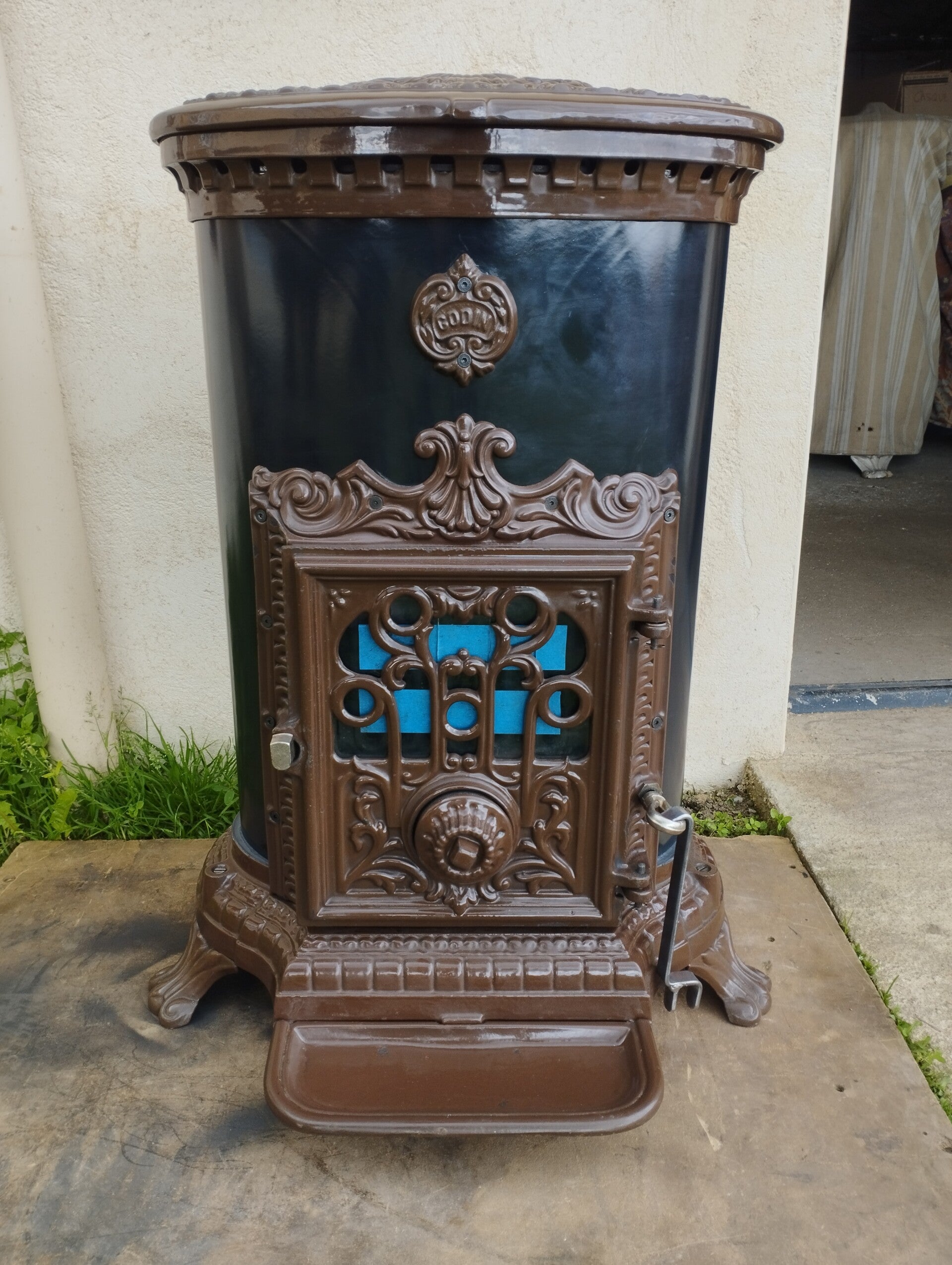 Poêle Godin 3726 ovale emmaillé marron sortie 125mm 4.64Kw buches 40cm