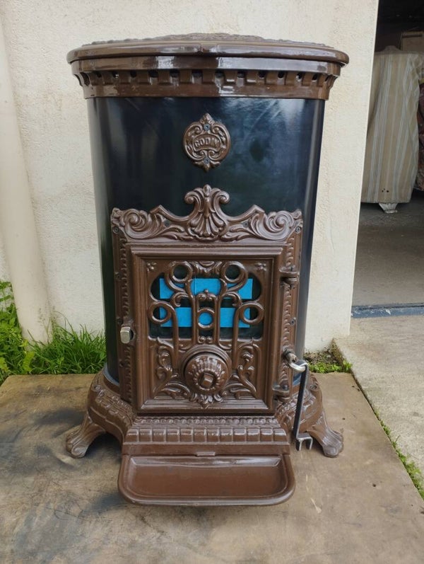 Poêle Godin 3726 ovale emmaillé marron sortie 125mm 4.64Kw buches 40cm