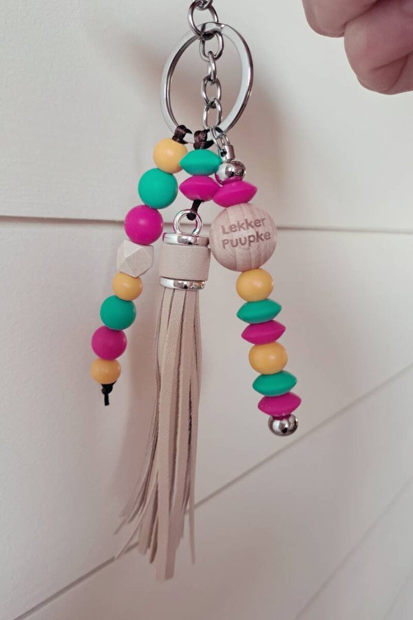 Sleutelhenger LEKKER PUUPKE - fuchsia (zilver)