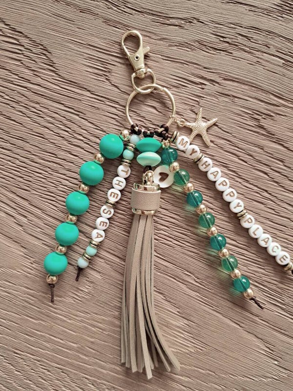 Sleutelhenger - DE ZIE - turquoise (goudkleurig)