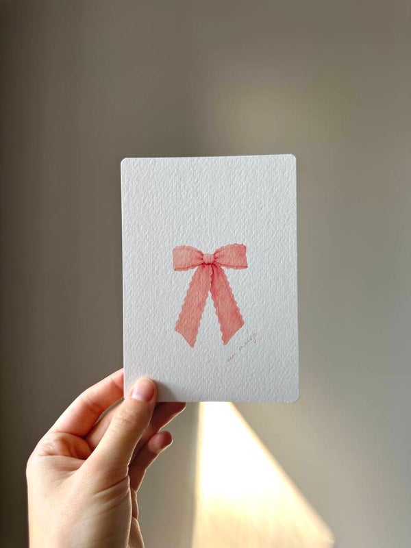 Kaart 'een meisje, roze strik'