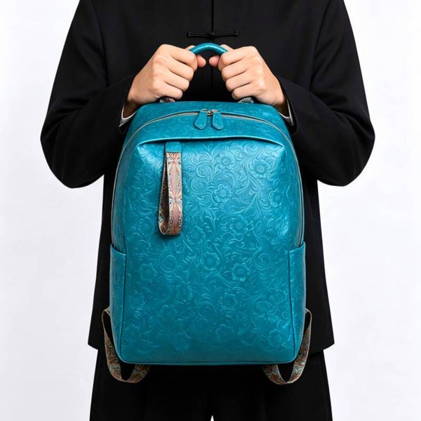 Original niche design genuine leather backpack with arabesque pattern, made of top-grain cowhide, perfect for commuting or as a laptop bag.