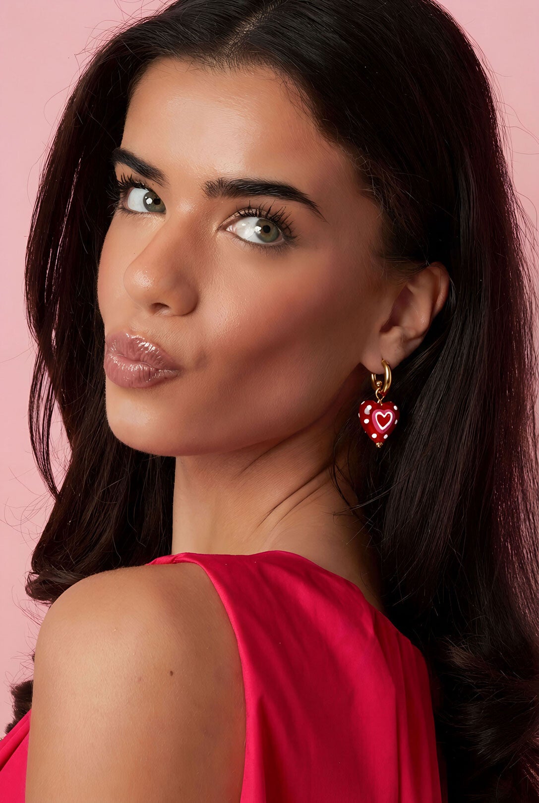 Oorbellen met hanger versierd met een hartje