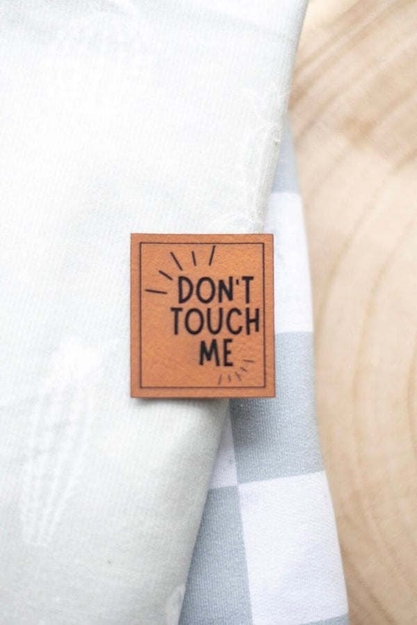 Don't touch me Label