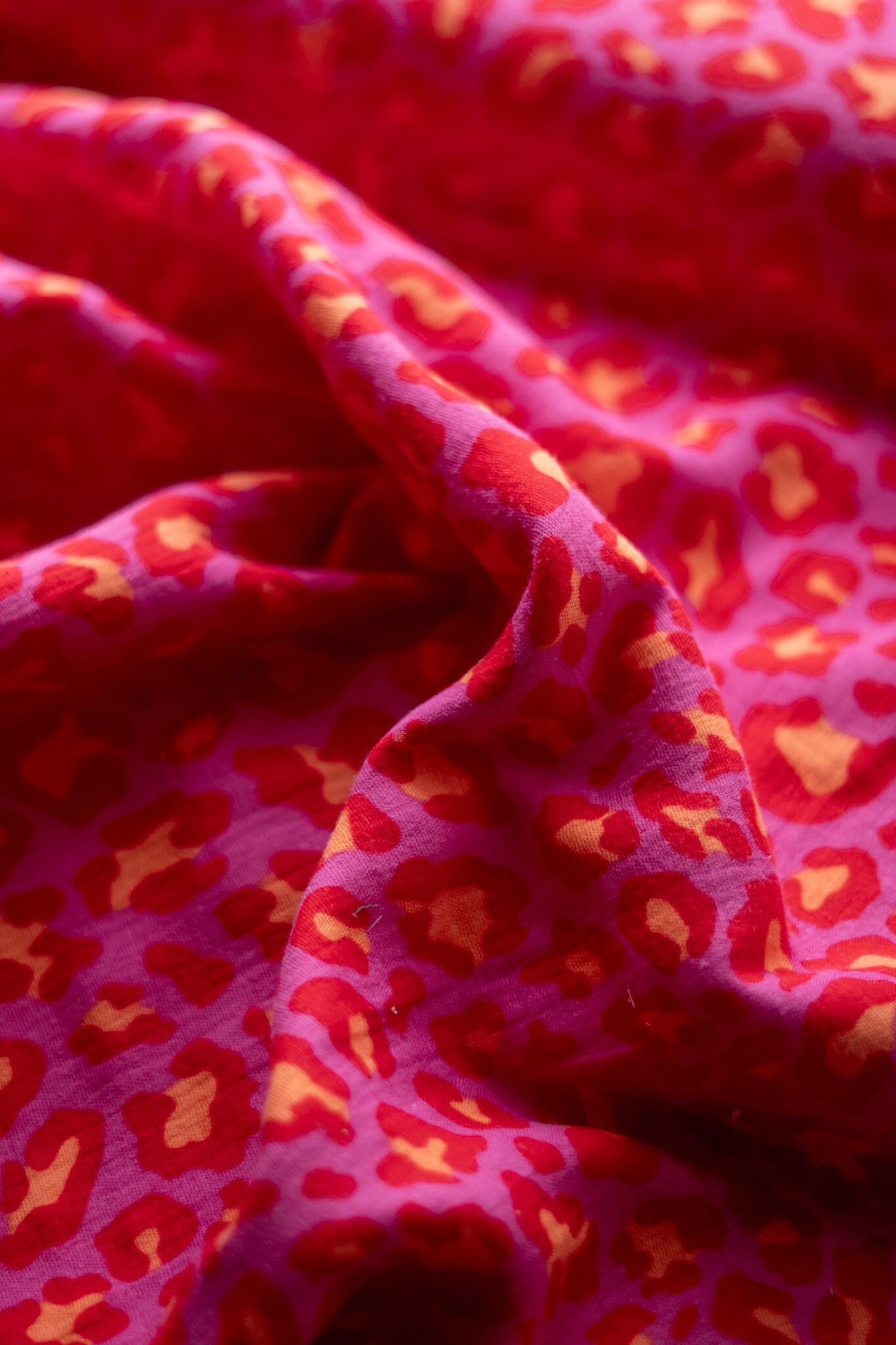 Musselin Leoflecken - pink orange