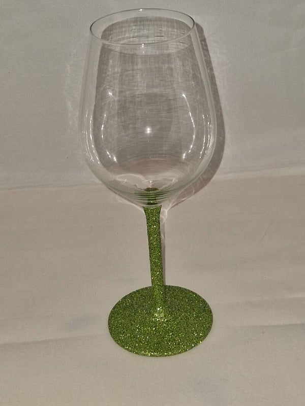 Wijnglas met groene glitters