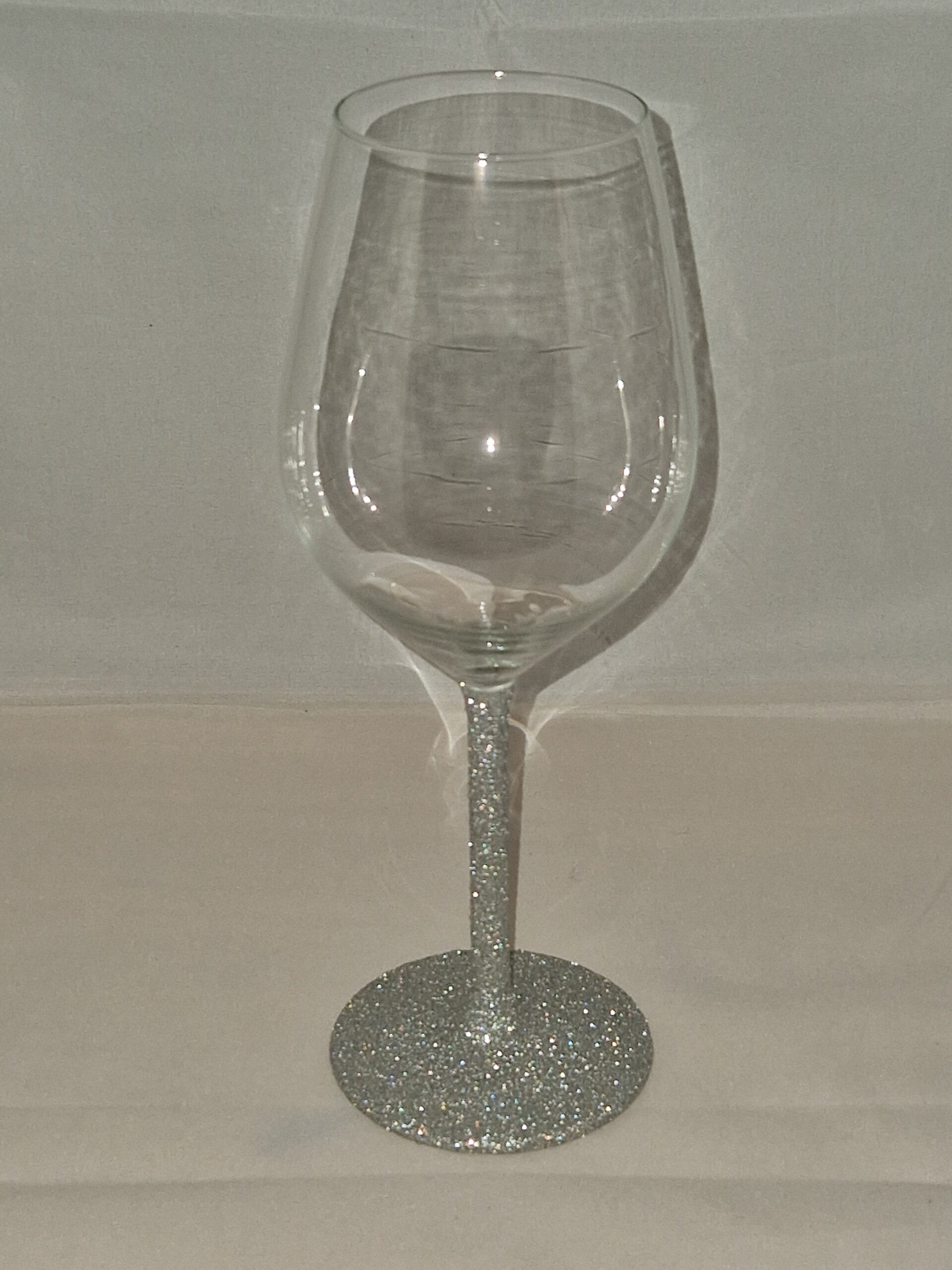 Wijnglas met zilveren glitters