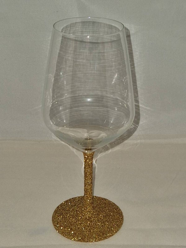 Wijnglas met gouden glitters
