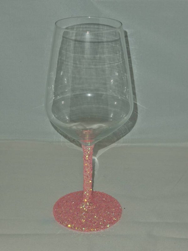 Wijnglas met grove roze glitters