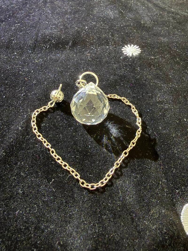 Pendule sphérique facetté en Cristal de Roche