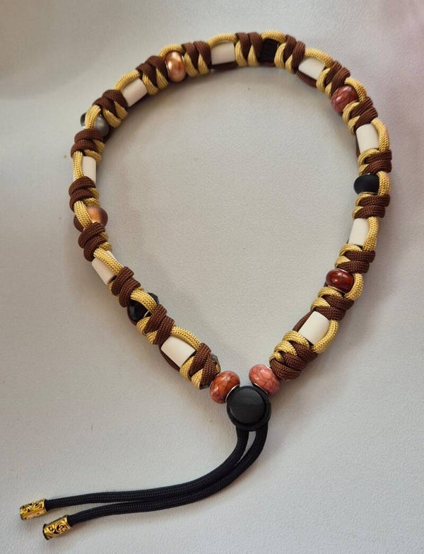 Tekenband bruin, goud, zwart gemixt met kralen