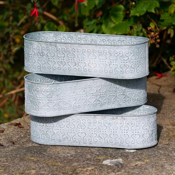 Set of three embossed planters