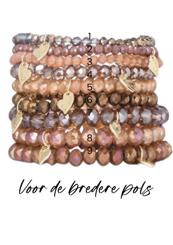 Kristal armbanden voor de bredere pols warme aarde/oranje tinten.
