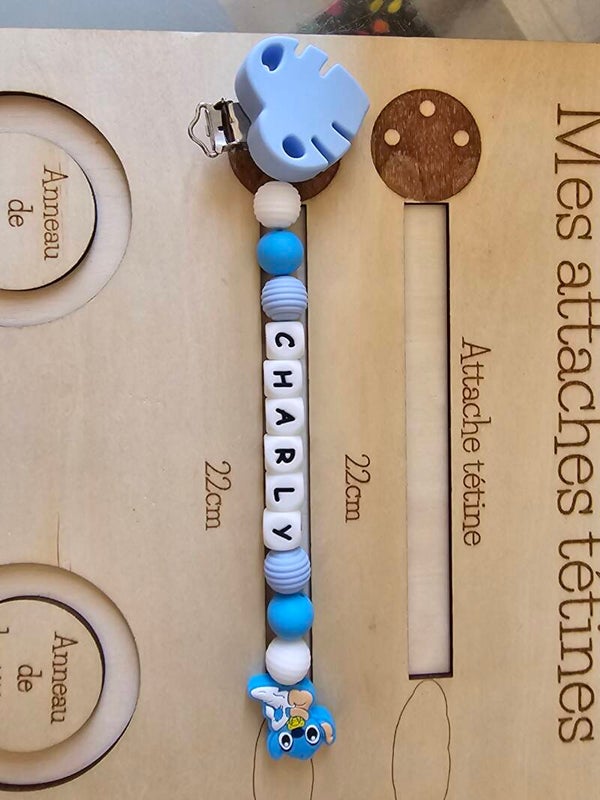 Attache tétine stitch