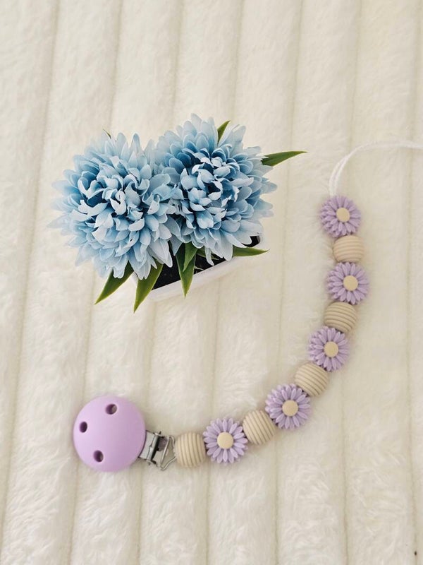 Attache tétine fleur lila