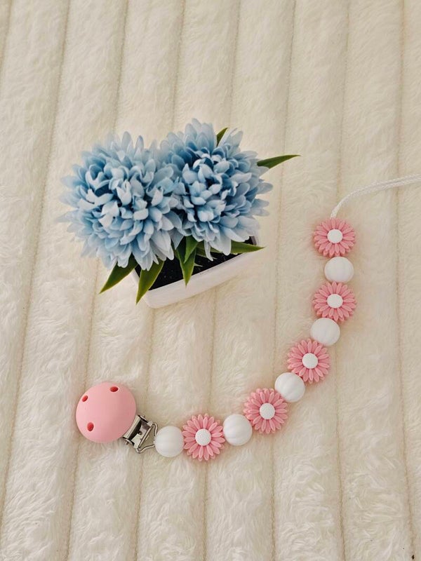 Attache tétine fleur rose