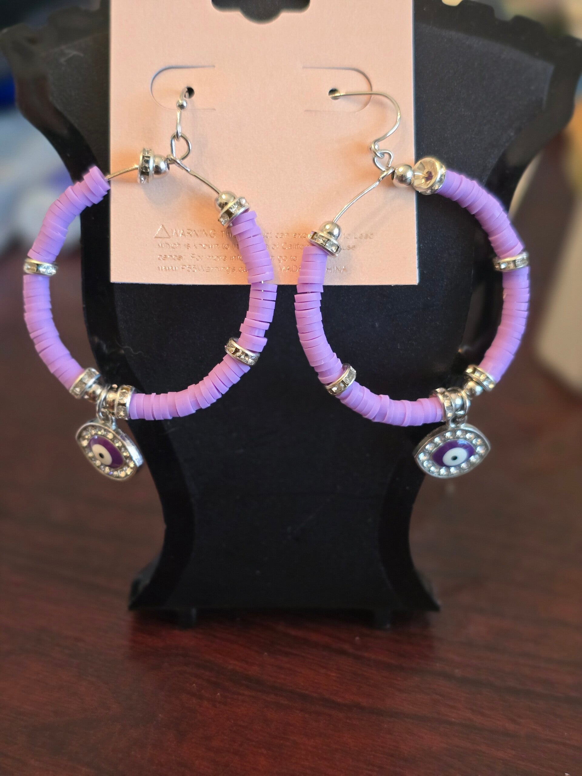 Purple evil eye earrings