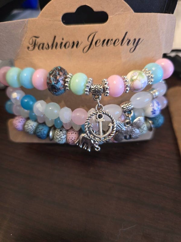 4 piece pastel bracelets with charm