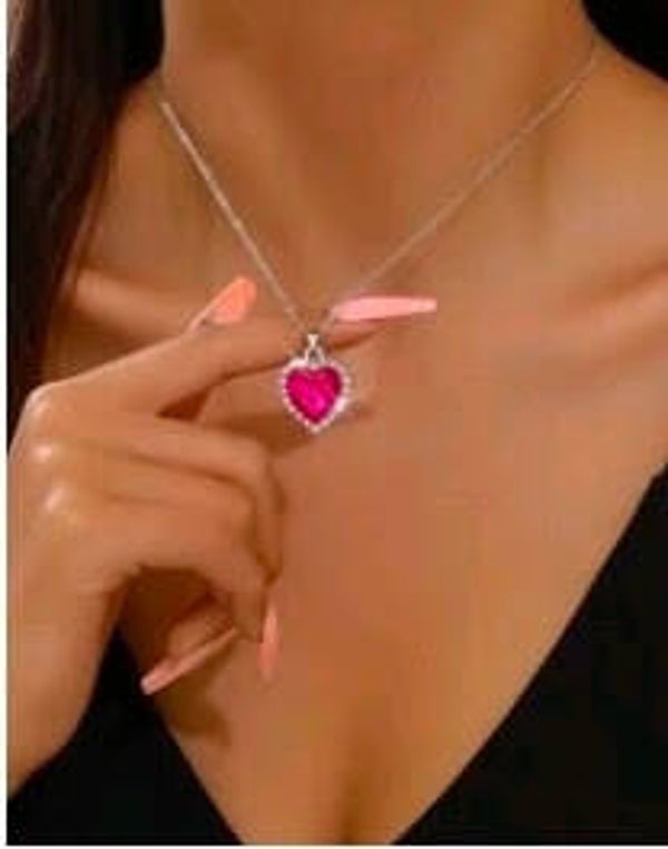 Heart necklace with a pink cz diamond stone and cz diamond accents