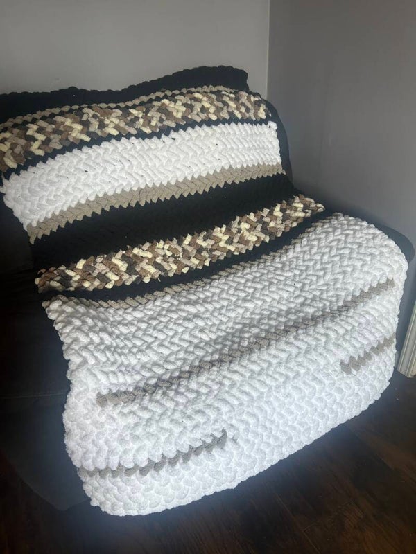 White, gray, and black with pillow