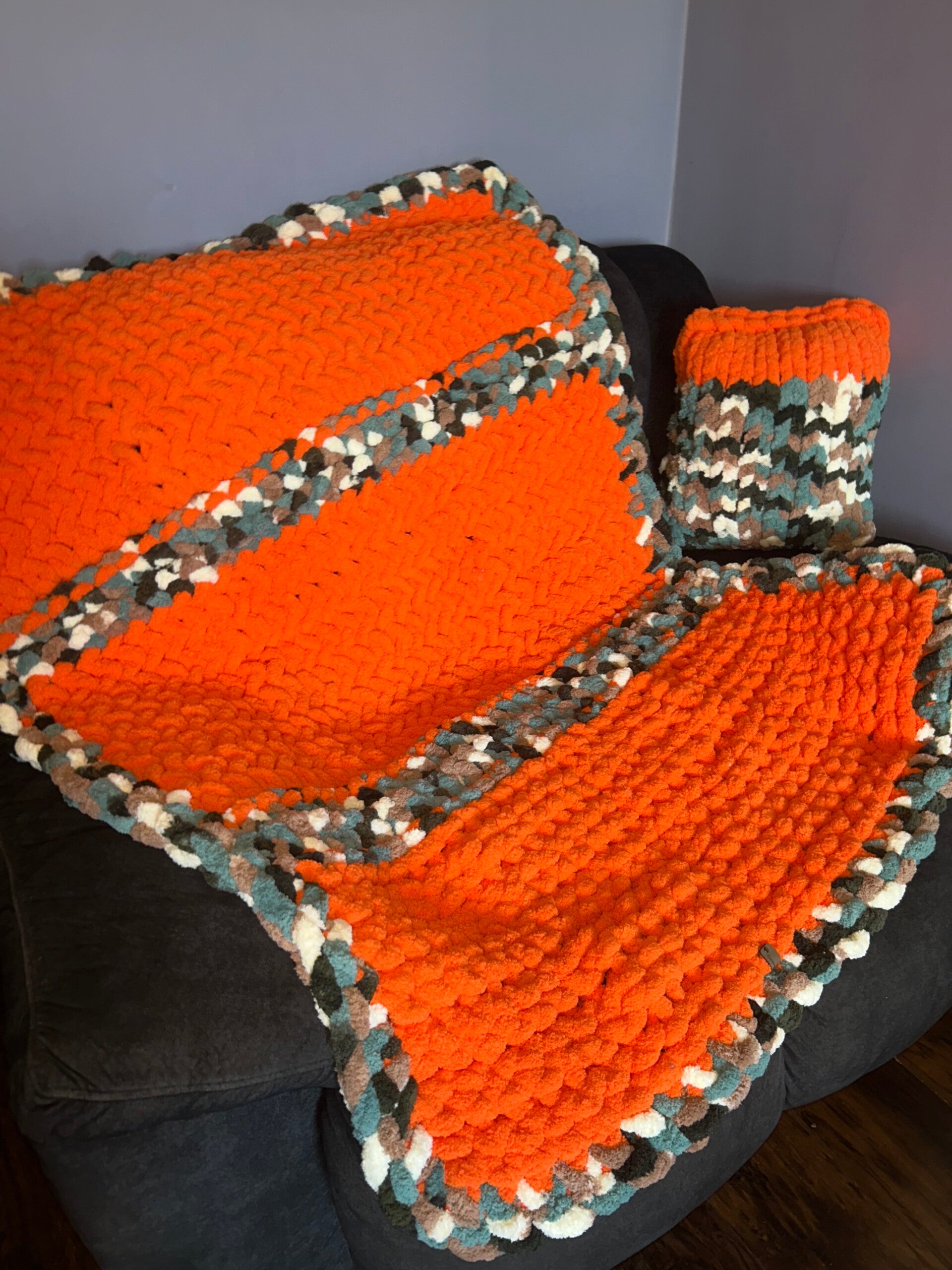 Orange with camo and a pillow