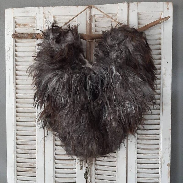 Wandhanger gemêleerd donker 08