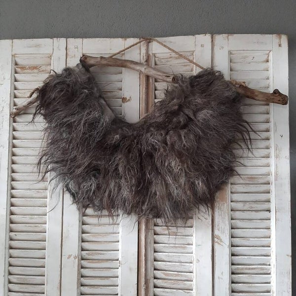 Wandhanger gemêleerd donker 09