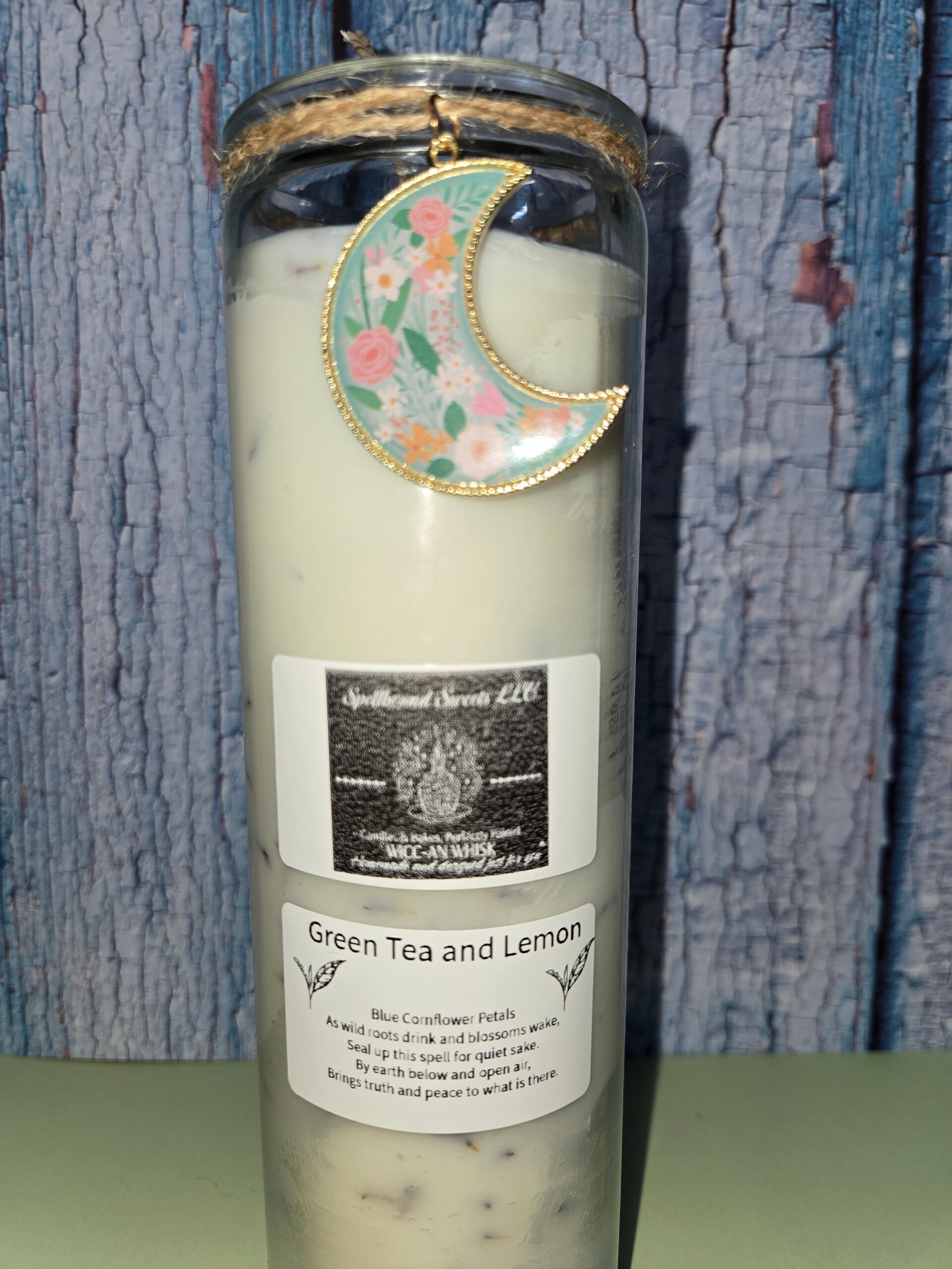 Moonlit Botanicals ( Green Tea and Lemon scented candle with real blue corn flower petals and a moon charm)